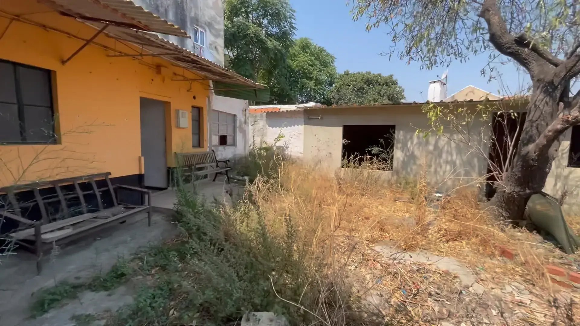 Existing built structures and patio at Quinta do Ferro, São Vicente, Lisbon.