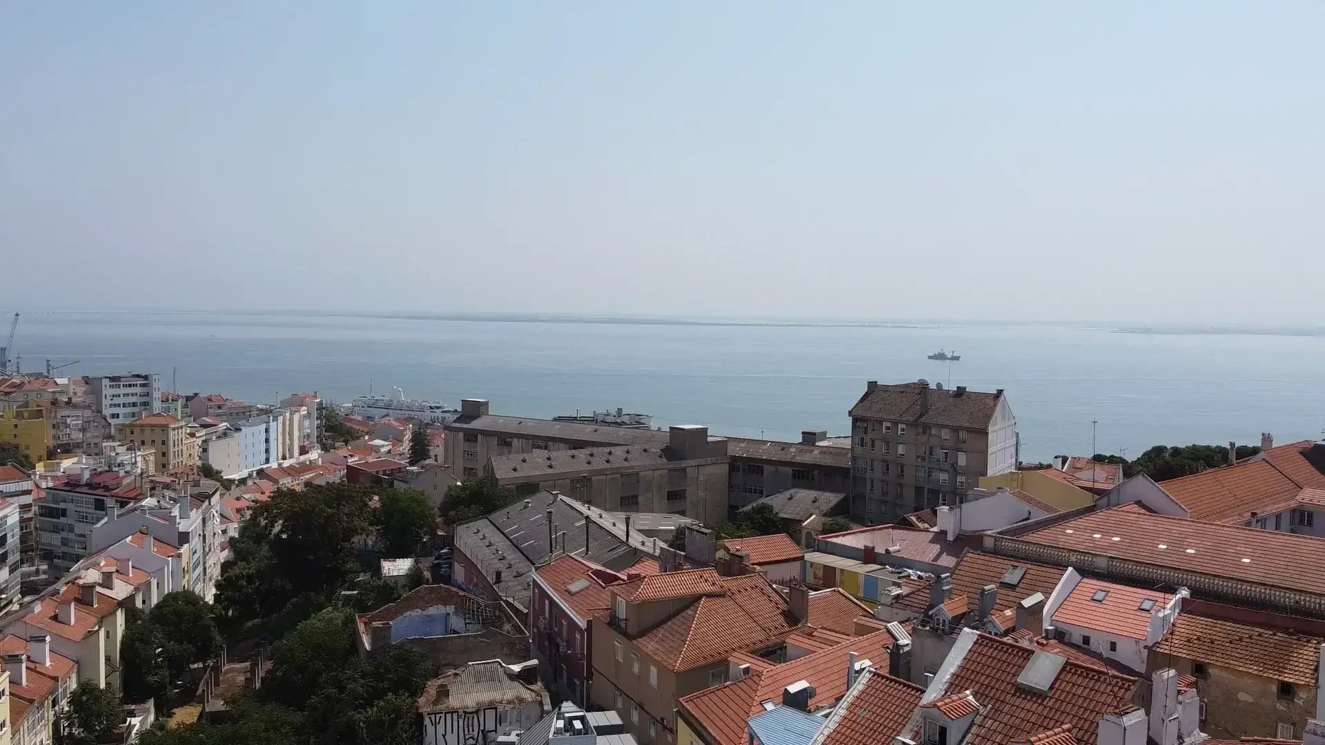 Rooftop view toward the Tagus river from São Vicente, Lisbon.