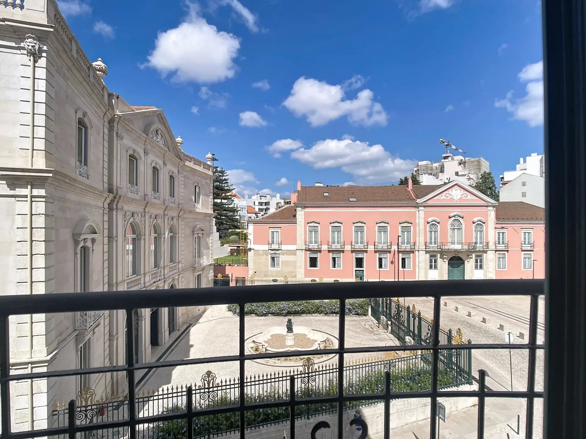 View from the balcony over a historic square near Palácio de Vilalva in Avenidas Novas, Lisbon