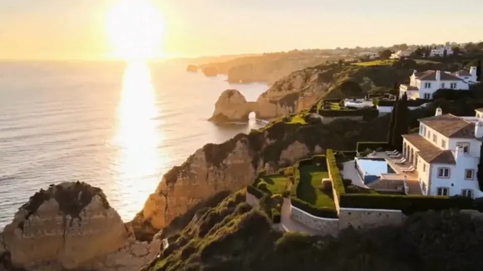 Cinematic Algarve villa and coastline at golden hour — layered double-exposure hero background, Cavalcanti RealEstate Team